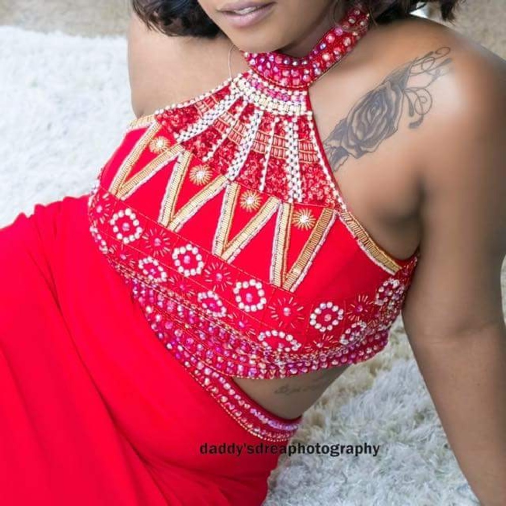 Red jeweled accented pageant or prom gown